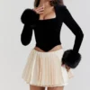 Emira Ivory Pleated Mini Skirt